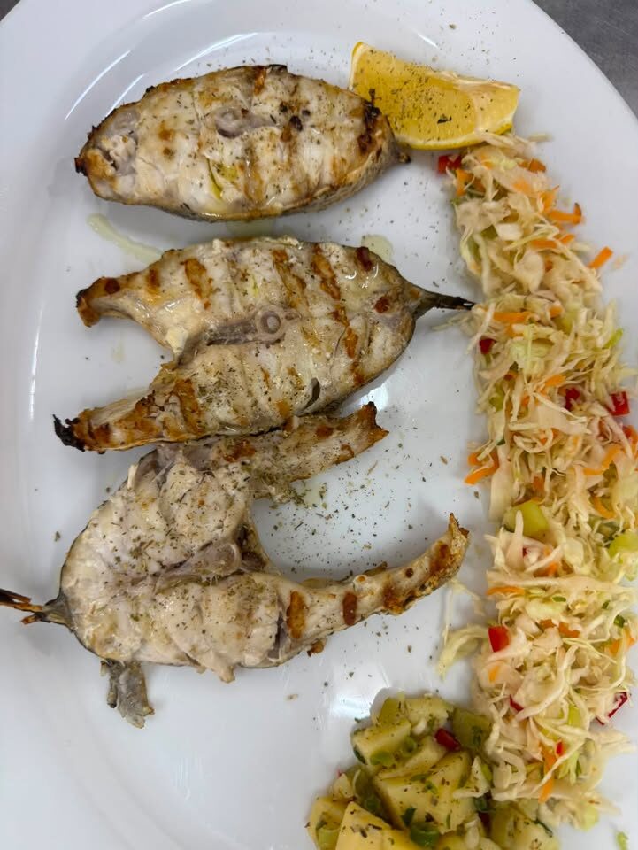 Grilled fish fresh off the flame